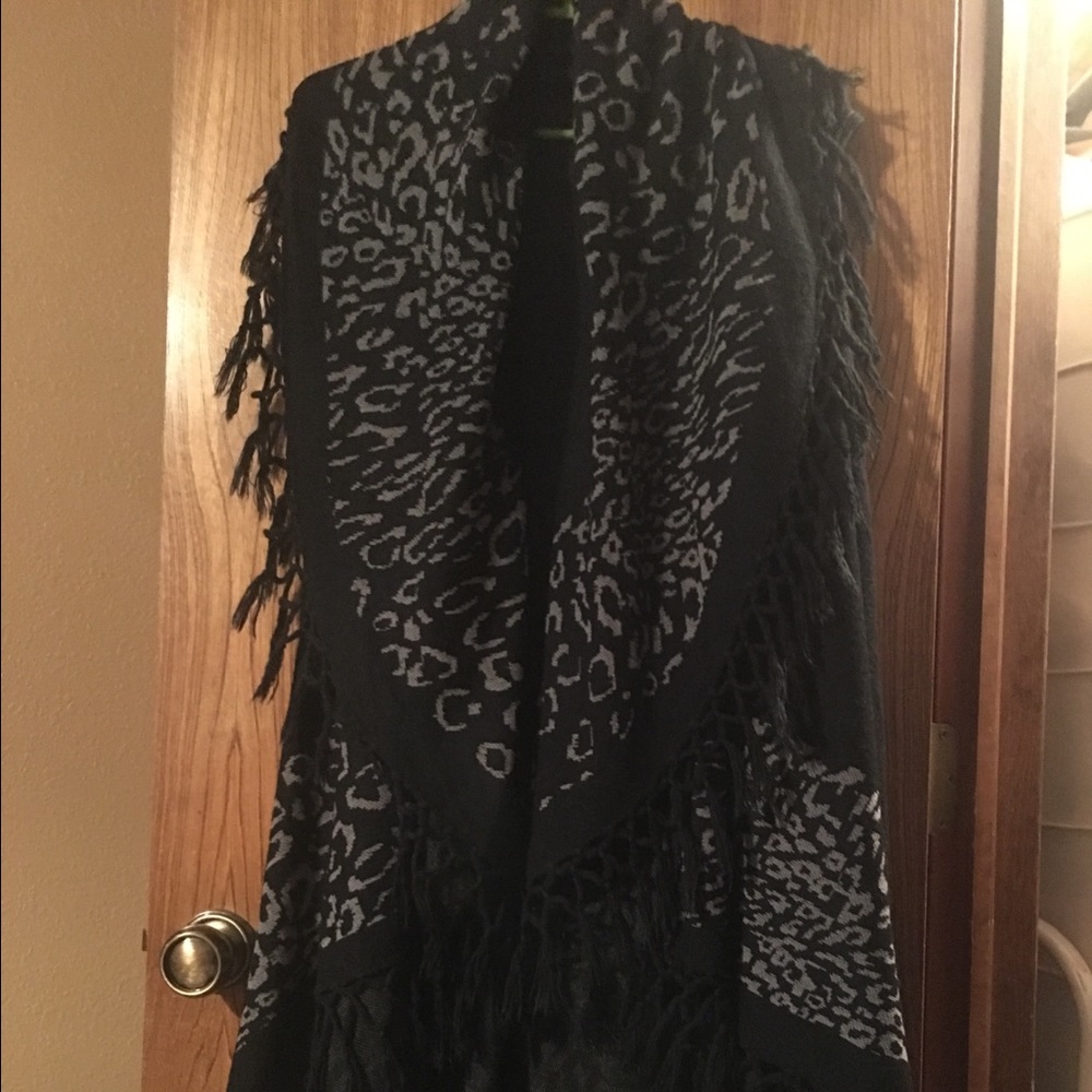 Grey and black poncho